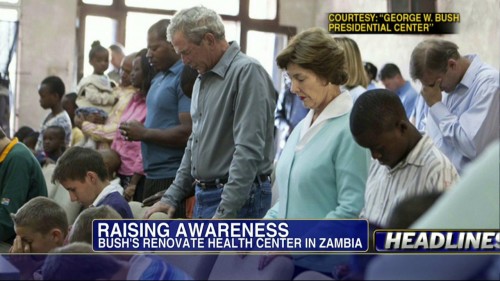 Bush com a esposa num culto na Zâmbia