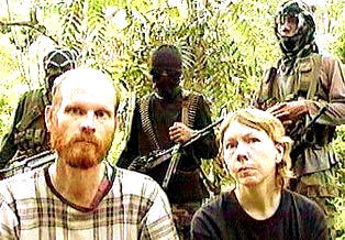 martin-and-gracia-burnham-with-abu-sayyaf-captors.jpg
